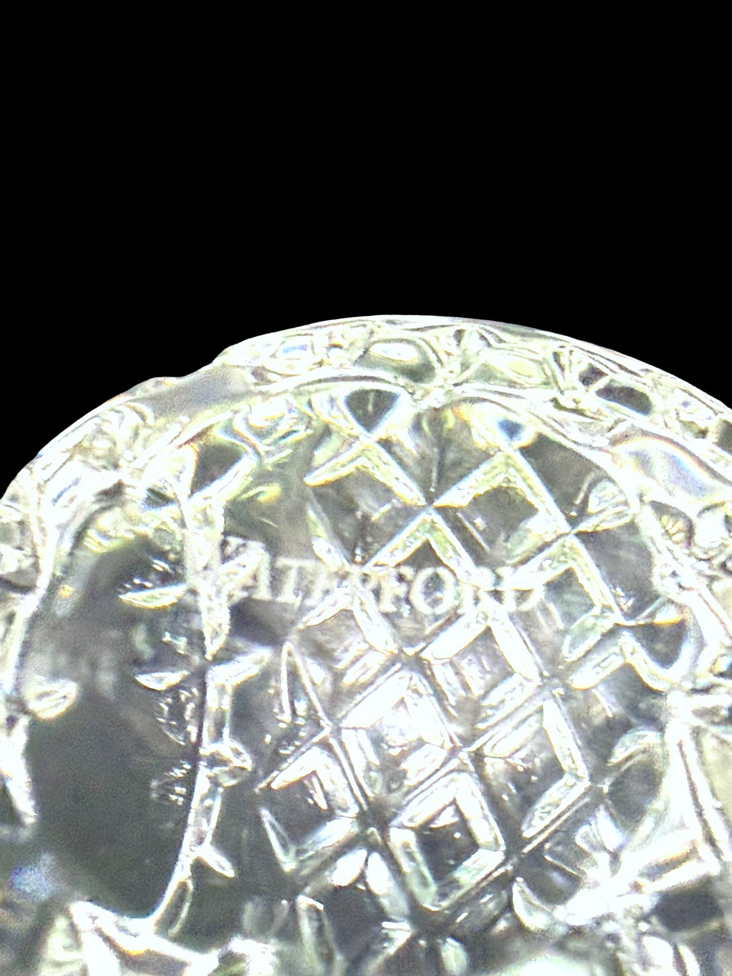 Waterford crystal paperweight close-up of etched Waterford mark