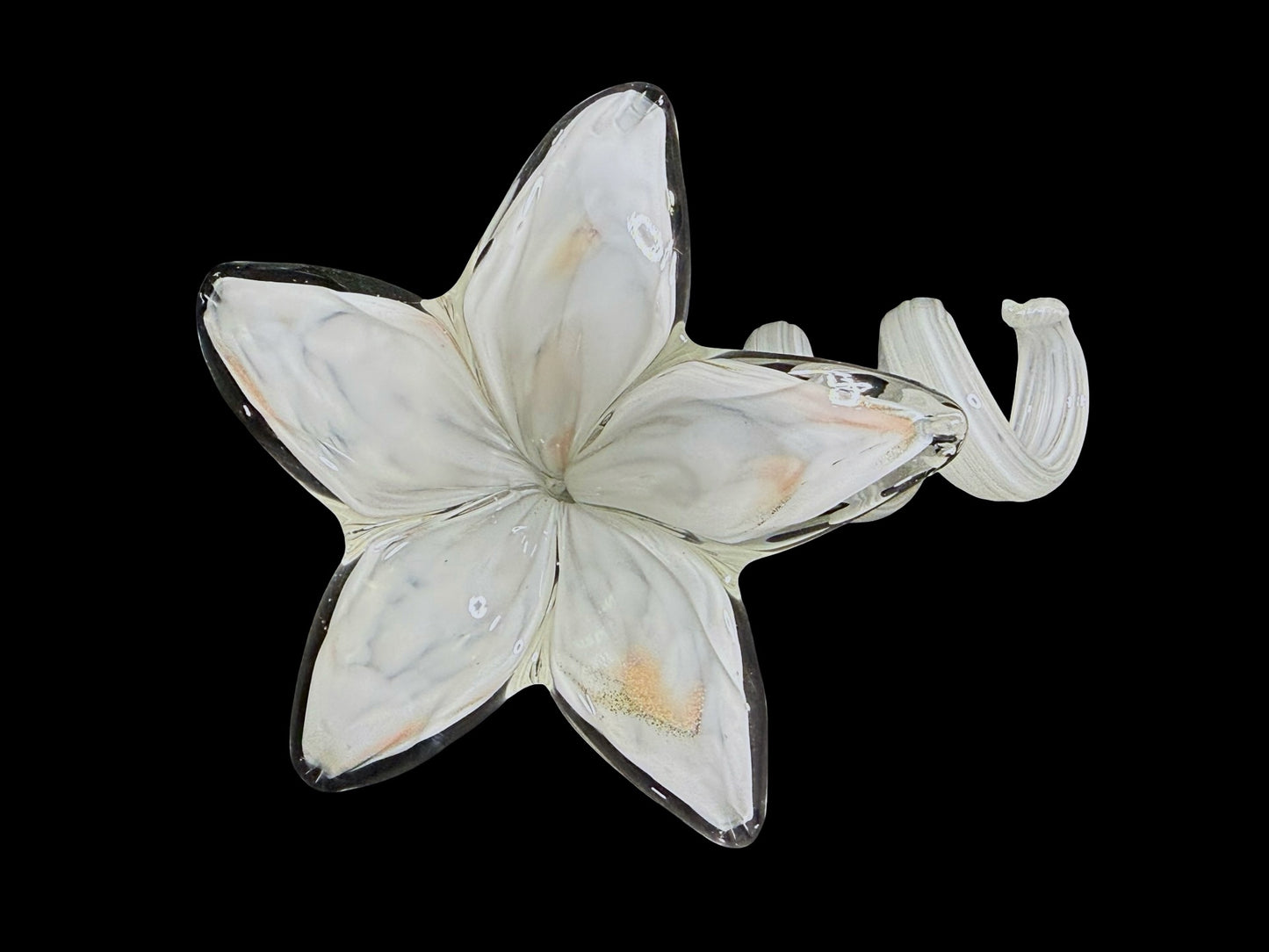 Blown glass flower figurine top view with curled tendrils