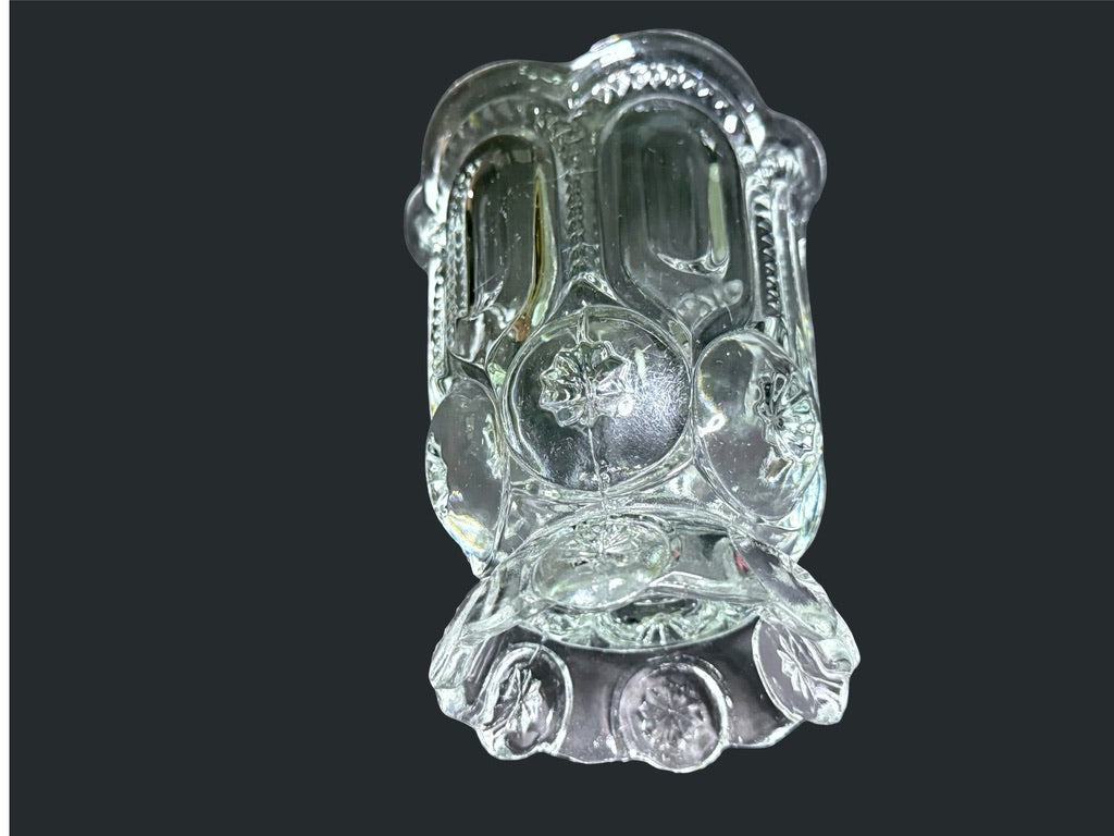 Vintage L.E. Smith Moon and Star clear glass vase angled view