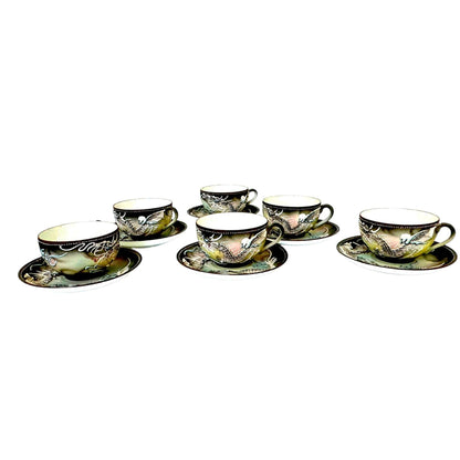 Circa 1920s-1930s Japanese Moriage Dragon ware Six Serving Tea Set with Tea Pot, Sugar Dish, Creamer Dish and Six Snack Plates