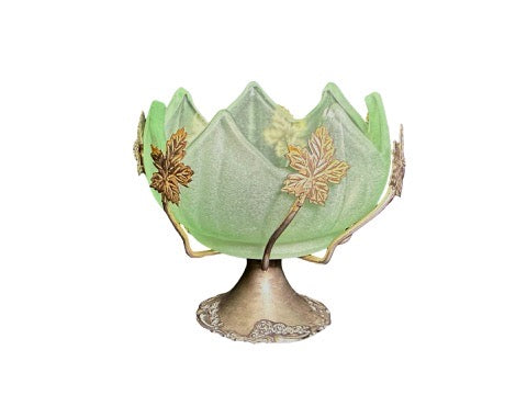 Side view of vintage Brama green glass bowl and decorative metal base
