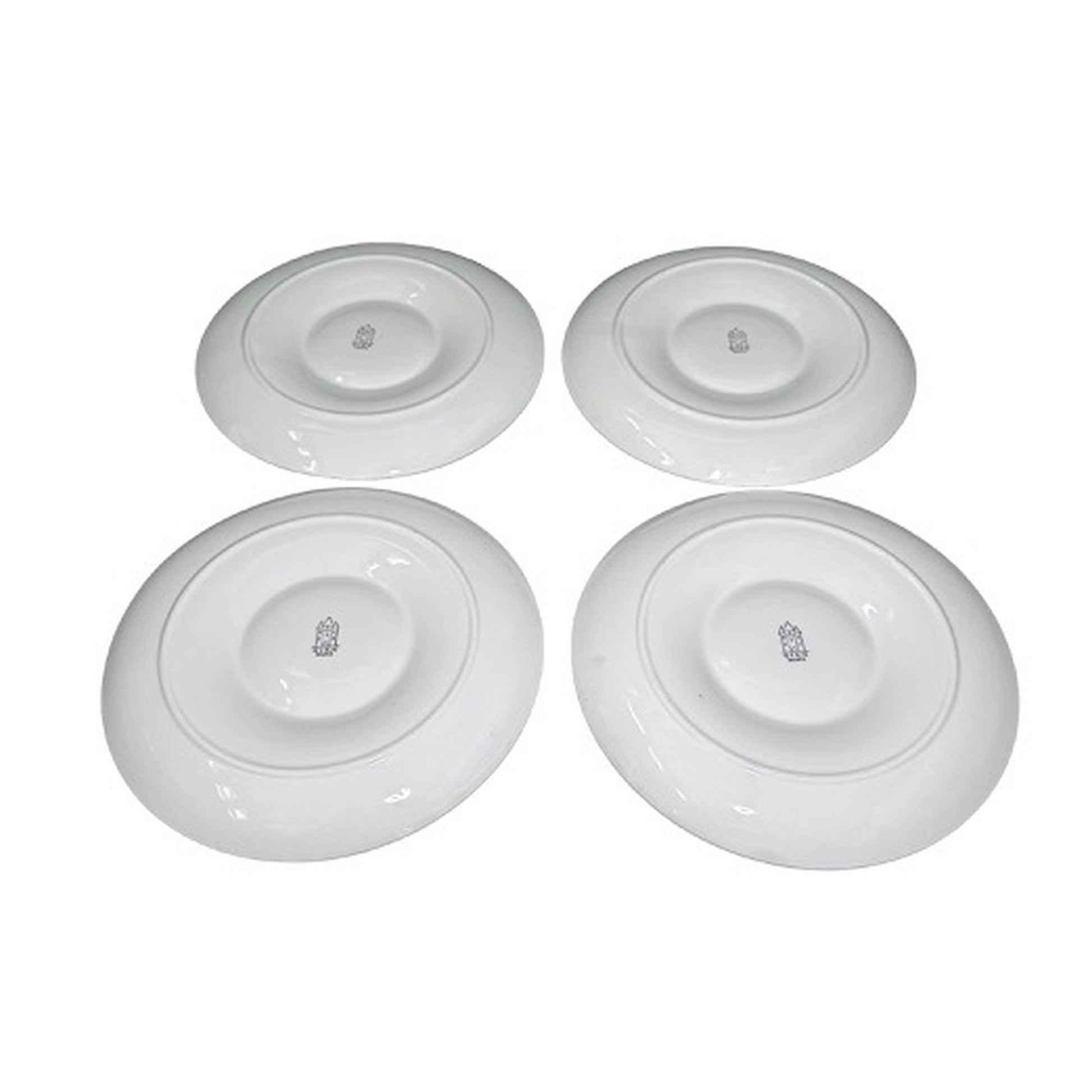 Underside angled views of four Gien France artichoke plates with maker marks