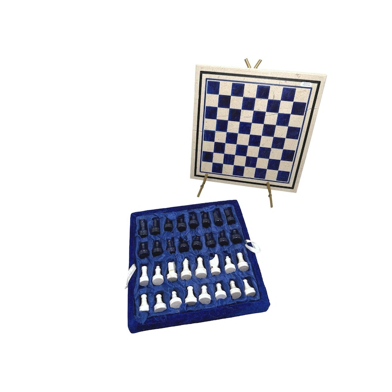 Stone chess set displayed on gold stand with storage box