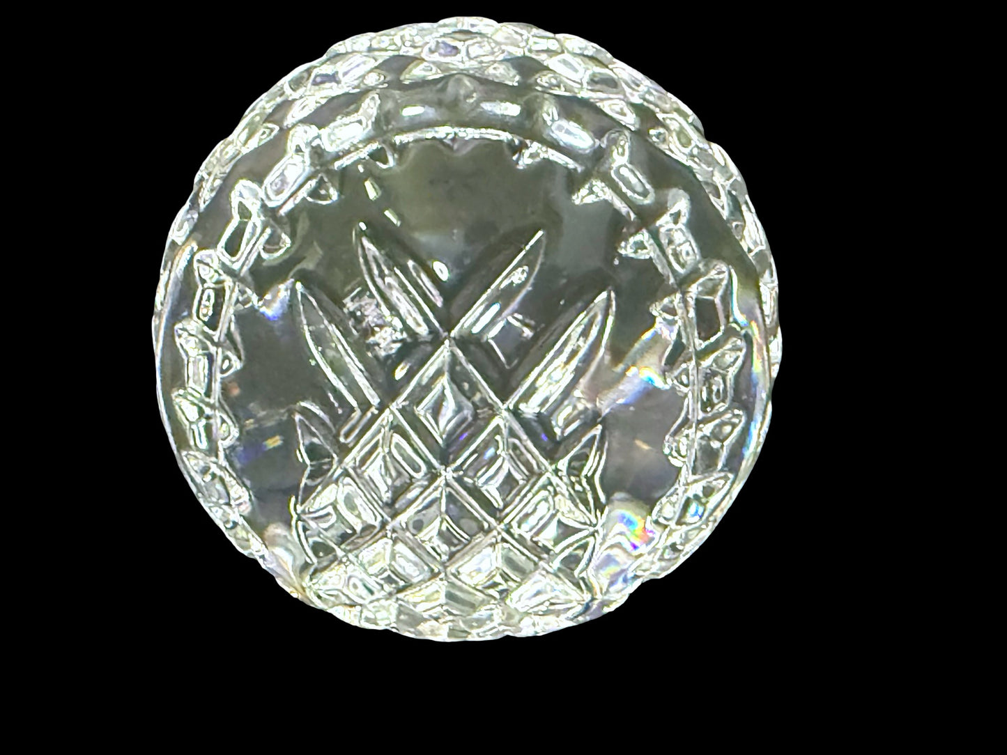 Waterford crystal paperweight underside and faceted edge detail