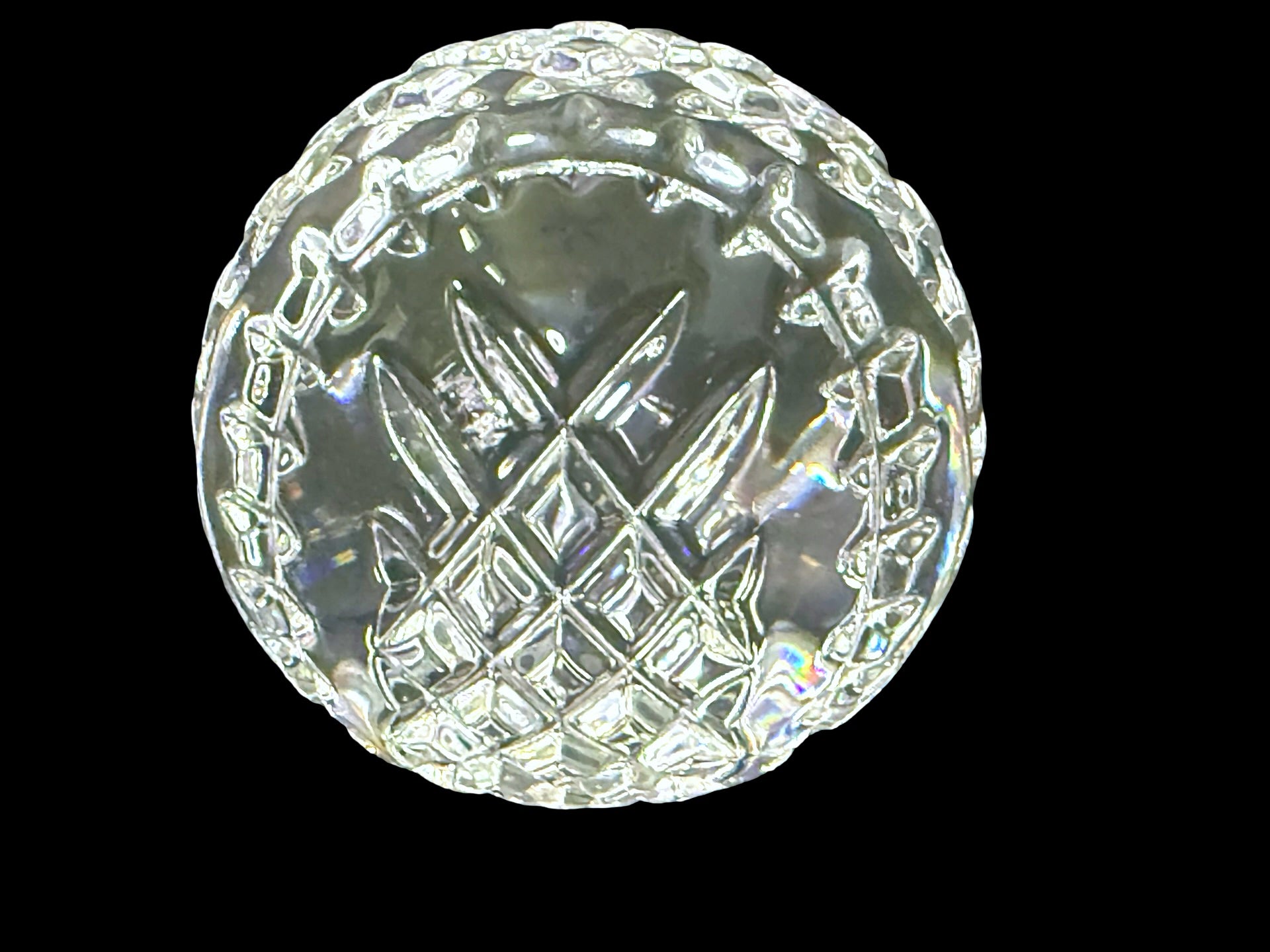 Waterford crystal paperweight underside and faceted edge detail